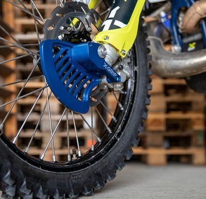 Захист переднього гальмівного диску X-GRIP Brake disc guard, silver, front KTM EXC(F), SX(F), XC-W, XC, XCF, XCF-W, 2016-> HQV TE, FE, TC, FC, TX, FX, 2016-> GASGAS EC(F), MC(F), EX(F), 2021-